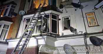 Baby boy and girl among four taken to hospital after flat fire in Mitcham