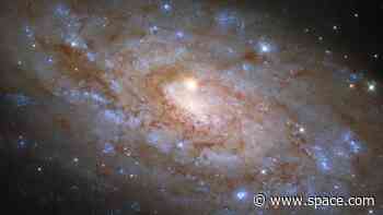 Nearby star photobombs portrait of a distant galaxy in new Hubble Telescope image