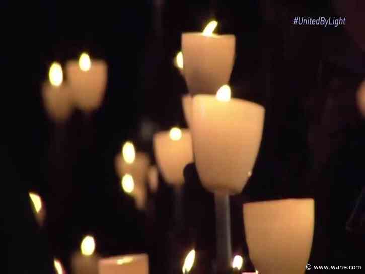 Candlelight vigil honors homicide victims and their families