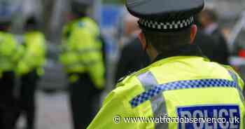 Two arrests over 'weapons' after man chased down road