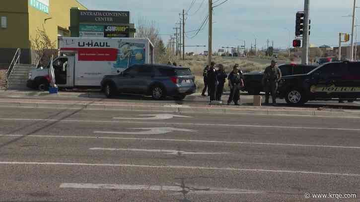Suspect in custody after fleeing from police in a U-Haul with people in the back