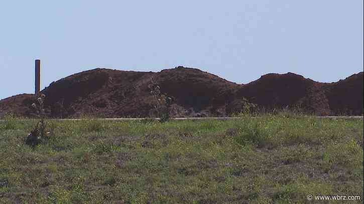 State approves parish plan to cover red dust plaguing residents for years