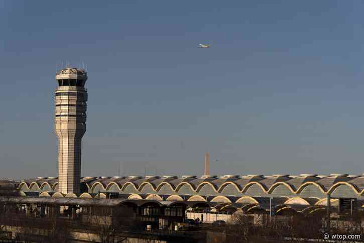 Near-collision investigation reveals Reagan National Airport controllers failed to stop flights during military flyover