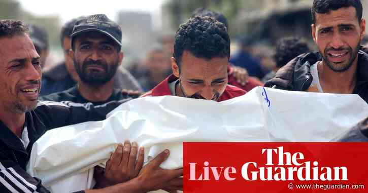 Dozens reported dead in Gaza after Israeli strike on residential block – as it happened