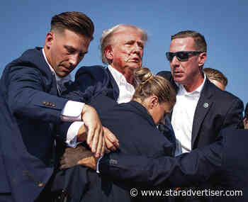 Woman charged with repeatedly posting threats to Biden, Trump