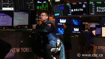 After massive surge on Wednesday, stock markets fall as trade war continues