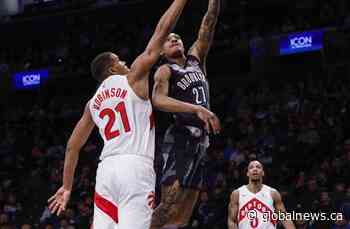 Toronto Raptors waive Robinson and Swider