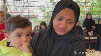 'Ahmad burned in front of the whole world,' says wife of Gaza journalist killed after Israeli strike