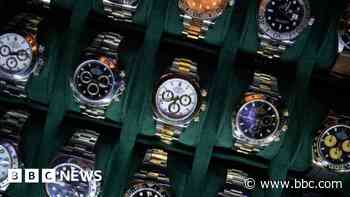 Luxury watch firm to close showrooms and cut jobs