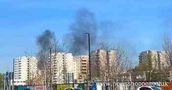 Major road closed after car crashes and catches fire in Thamesmead