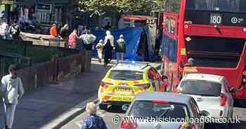 RECAP after blue sheet erected around bus stop after incident in Plumstead