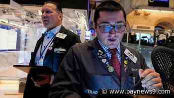 U.S. stocks jump, bond market swings to cap Wall Street's chaotic and historic week