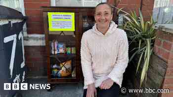Woman creates community pantry at front of house
