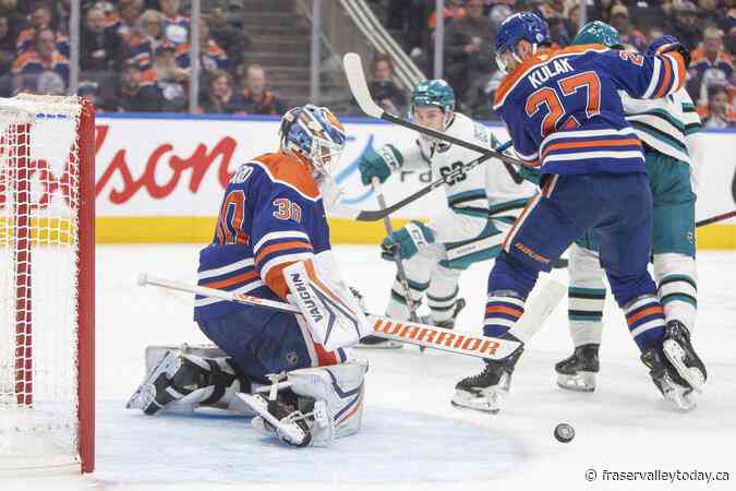 Oilers clinch playoff spot, but lose two key players in the process