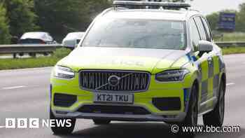 Road closed following car and motorcycle crash