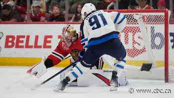 Winnipeg Jets score Central Division title after defeating Chicago 5-4
