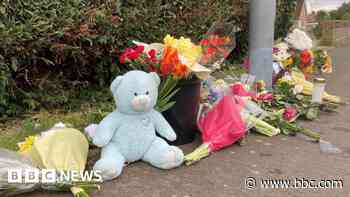 Flowers left after young boy killed in van crash