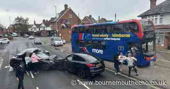 Four people injured in high street smash