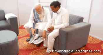 Watch: PM Modi fulfils 14-year vow of barefoot admirer, makes him wear shoes