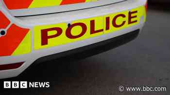 Teen arrested over email threats to schools