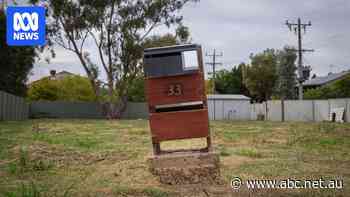 This town is a 'canary in the coal mine' as climate change threatens home ownership
