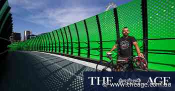 Green bike bridge’s overdue opening a welcome sight for cyclists in Docklands