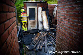 Forse schade na brand bij een achtertuin