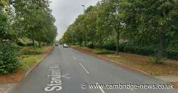 Long delays after car overturns in Cambridgeshire city