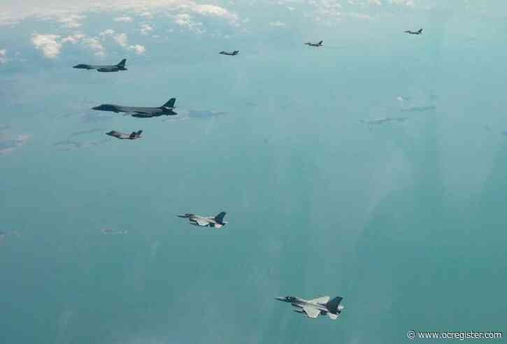 US flies long-range bomber for drill with South Korea, as the North marks a key state anniversary