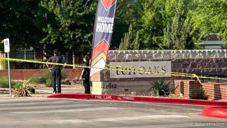 Man ran at ex-girlfriend's car with pickaxe before being shot, police say