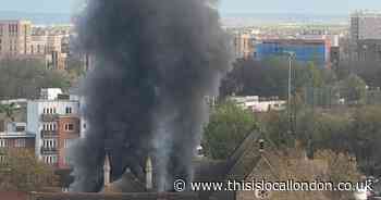 Huge plumes of black smoke seen after fire at derelict Erith building