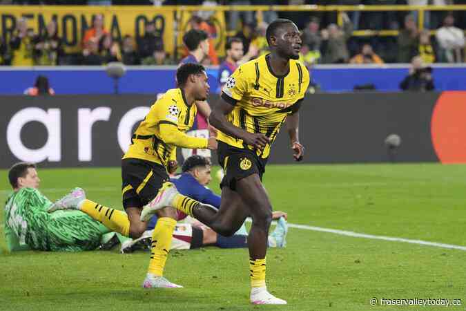 Guirassy scores a hat trick in vain for Dortmund as Barcelona advances to Champions League semis