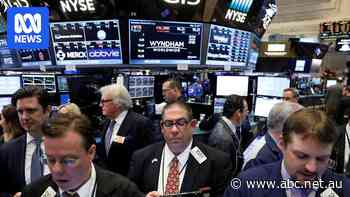 Live: Wall Street closes in the red after volatile trade