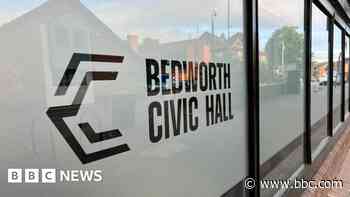 Trustee of community venue charged with assault