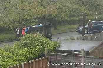 Woman taken to hospital after car overturns in Cambridgeshire city