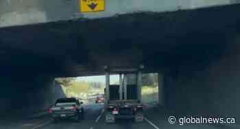Box truck strikes Highway 1 Langley overpass