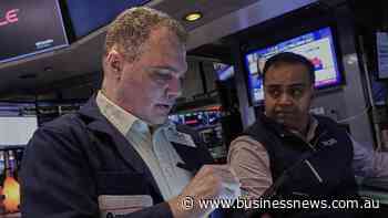 Indexes drop as Fed says growth appears to be slowing