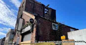 Police charge two youths aged 13 and 15 over huge town centre building fire