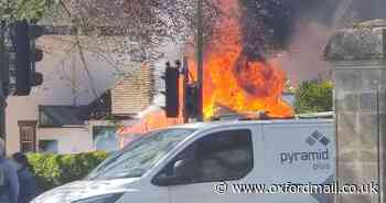 Dramatic photos show garden shed on fire in town