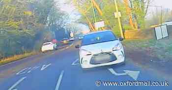 Shocking footage shows drink driver swerving and dangerously overtaking