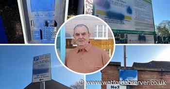 Signs defaced as parking row escalates into 'vigilante' action