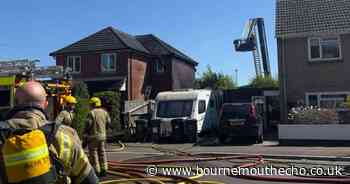 Fire crews tackle blaze as smoke seen billowing from roof