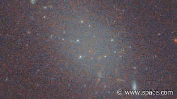 Ghostly galaxy without dark matter baffles astronomers