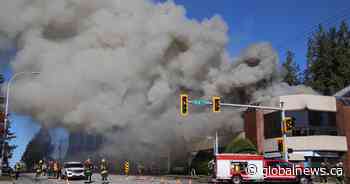 Firefighters respond to large blaze burning in Surrey commercial building