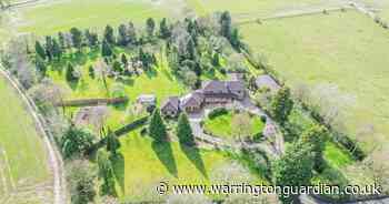This house with four acres of land, stables and a pond is for sale in Warrington