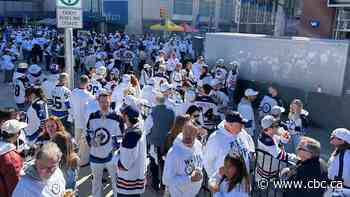 Spring whiteout hits downtown Winnipeg as thousands take to street for start of Jets' playoff run