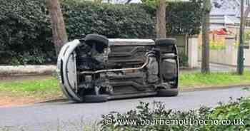Car flips onto side after two vehicle crash