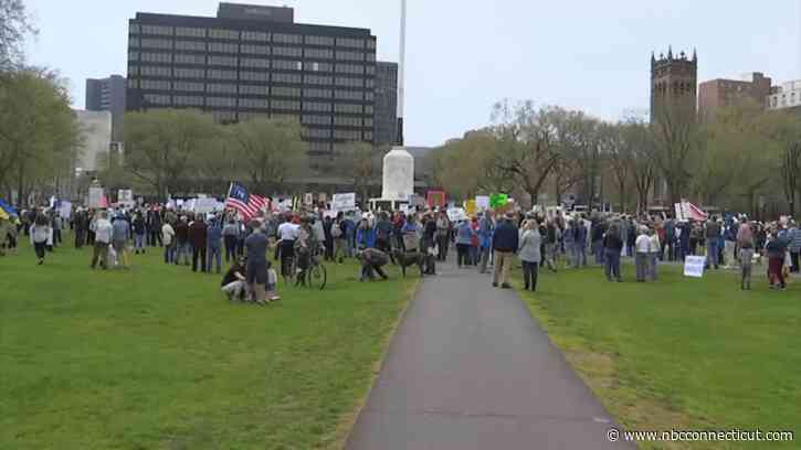 Protesters gather on New Haven Green to advocate against Project 2025, other policies
