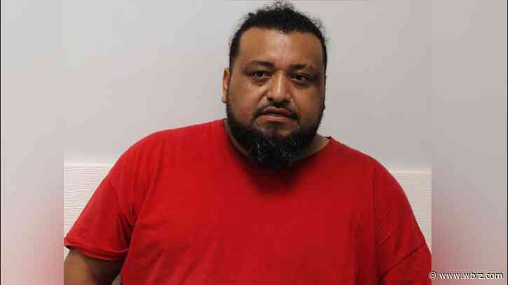 Man accused of shooting gun from apartment balcony on Easter morning arrested