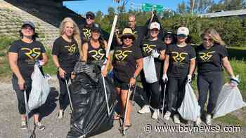 Devin Pappas leads her group of volunteers to good works